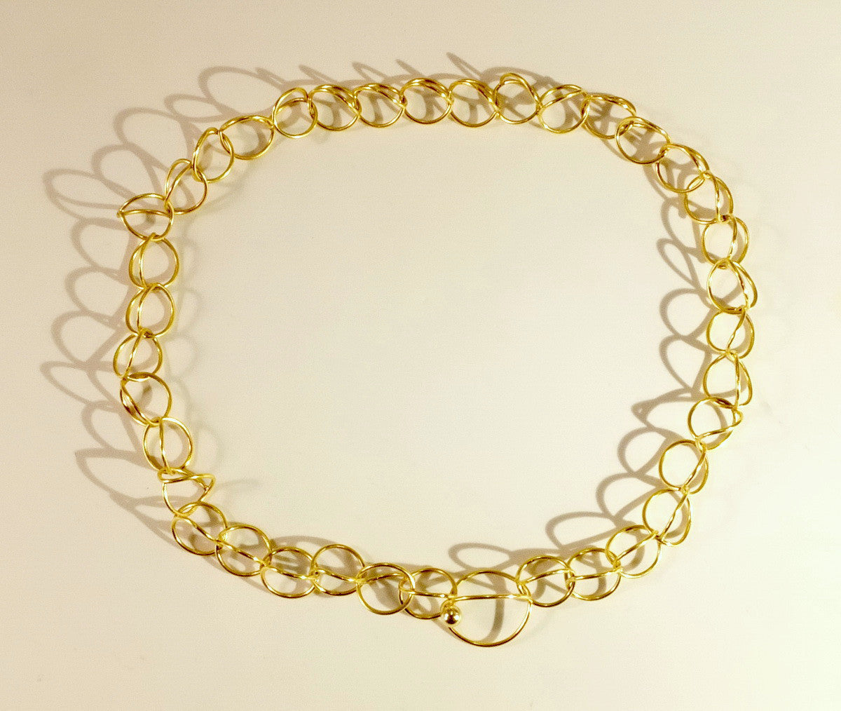 "2CV" gold necklace
